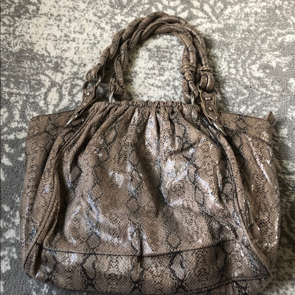 Brown snakeskin bag.